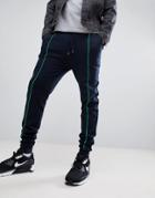 Asos Design Skinny Joggers In Navy With Light Green Piping - Navy