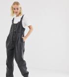 Reclaimed Vintage Inspired Denim Jumpsuit With Button Front And Buckle Detail-black