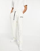 Asos Actual Set Oversized Sweatpants In Ecru Brushed Cotton With Straight Hem And Printed Logo-white