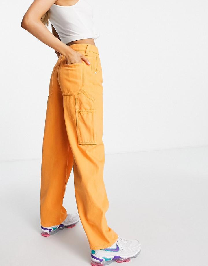 Asos Design Oversized Skater Jean In Orange With Cargo Styling