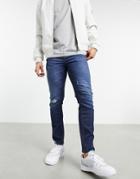 Asos Design Cropped Skinny Jeans In 'less Thirsty' Dark Blue Wash With Rips-blues