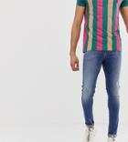 Asos Design Tall Spray On Jeans In Power Stretch Denim In Mid Wash Blue - Blue