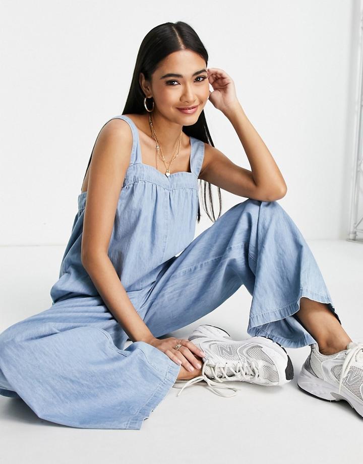 Asos Design Soft Denim Smock Jumpsuit In Lighwash-blue