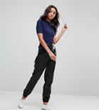 Asos Tall Low Rise Track Pant In Soft Leather Look - Black