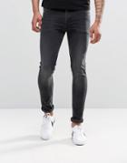 Asos Super Skinny Jeans In 12.5oz In Washed Black - Black