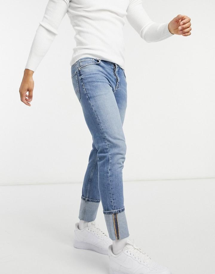 Asos Design Stretch Slim Jeans In Mid Wash Blue With Deep Cuff