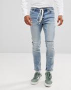 Asos Skinny Jeans In Mid Wash With Rip And Repair And Lace Belt - Blue