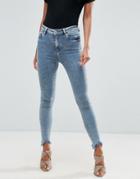 Asos Ridley Skinny Jeans In Rula Mottled Wash With Arched Raw Hem - Blue