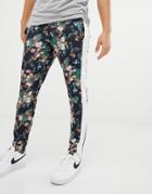 Asos Design Skinny Joggers In Retro Track Fabric With Floral Print And Side Stripes - Black