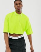 Asos Design Cropped Oversized Polo Shirt With Half Sleeve And Zip Neck And Tipping In Neon Green - Green