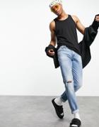 Asos Design Slim Jeans In Vintage Light Wash With Knee Rip-blues