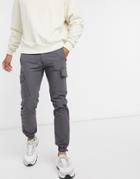 Asos Design Slim Cargo Pants With Toggle Hem In Black Ripstop
