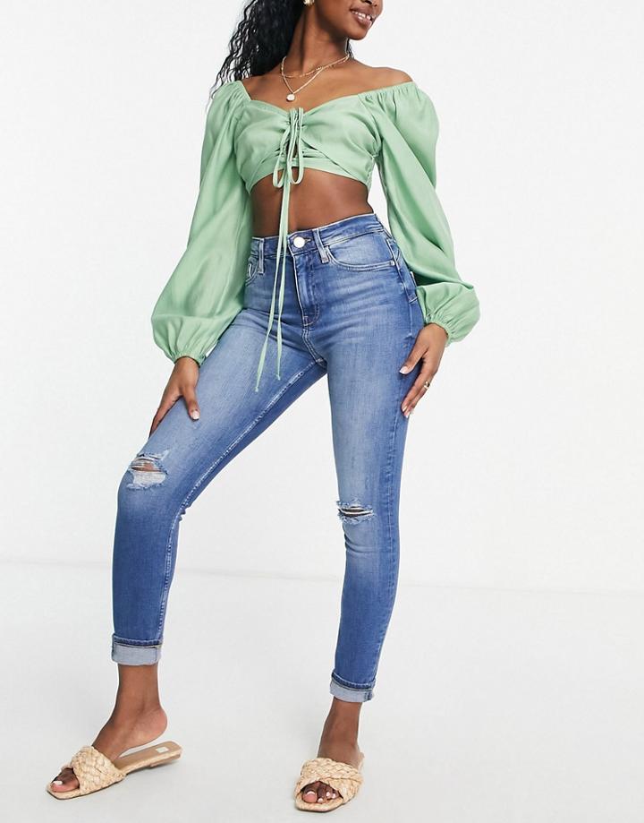 River Island High Rise Ripped Skinny Jeans In Medium Blue
