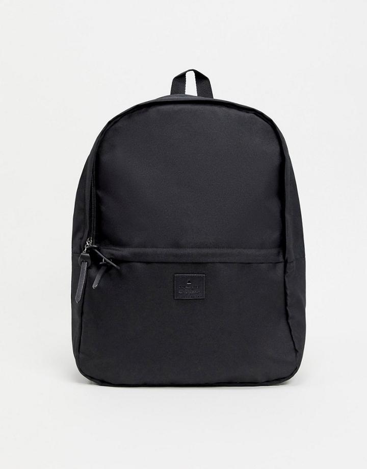 Asos Unrvlld Supply Backpack In Black With Branded Patch