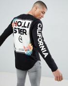 Hollister Colour Change Floral Logo Long Sleeve Top In Black - Black
