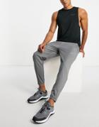 Nike Running Dri-fit Challenger Woven Pants In Gray