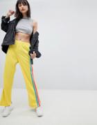 Asos Design Trackpants With Rainbow Side Stripe And Vent Detail-yellow