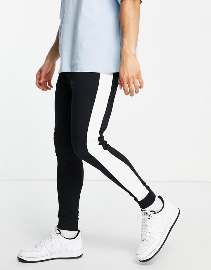 Asos Design Organic Skinny Sweatpants With Side Stripe In Black