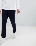 Asos Tapered Woven Joggers In Navy - Navy