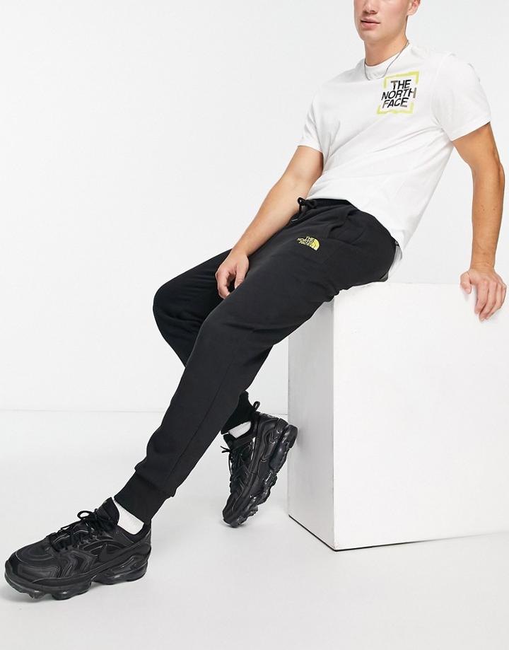The North Face Graphic Joggers In Black