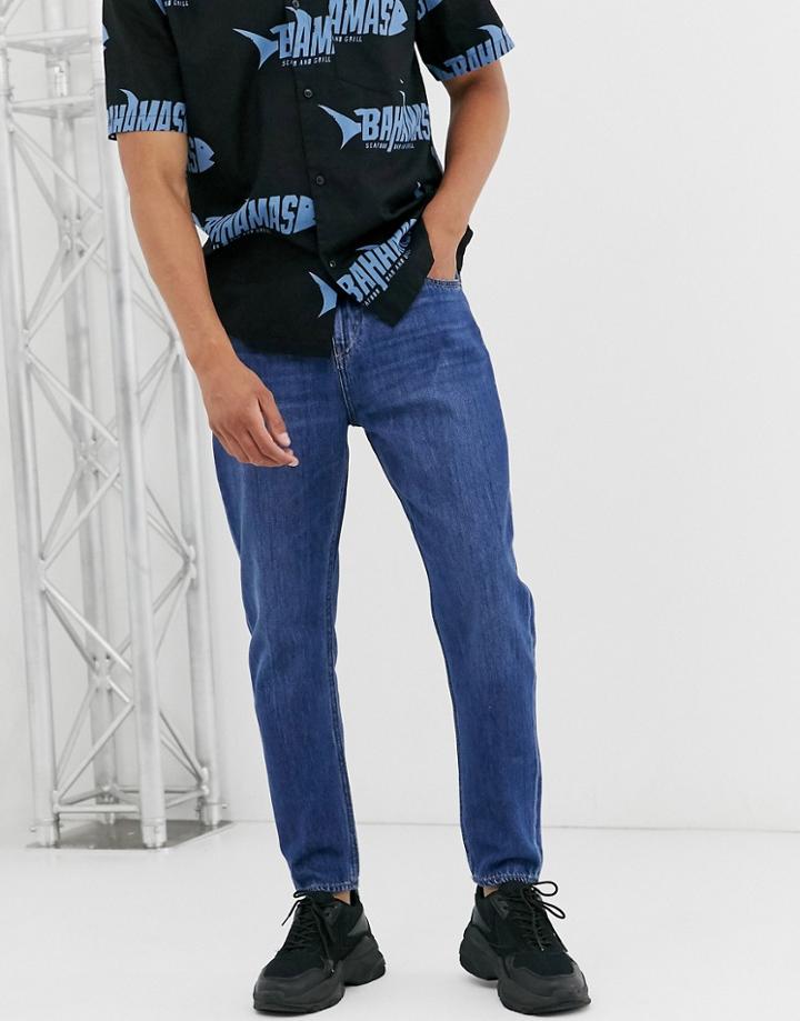 Weekday Bobbin Relaxed Tapered Jeans In Mid Blue Wash - Blue