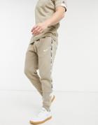 Nike Repeat Pack Taping Cuffed Sweatpants In Dusty Khaki-green