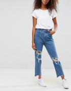 Asos Original Mom Jeans In Olivia Mottled Wash With Rips And Busts And Extreme Chewed Hem - Blue