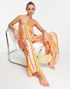 River Island 70s Print Tie Back Bandeau Beach Jumpsuit In Orange
