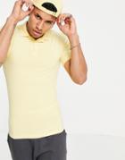 Asos Design Organic Muscle Fit Jersey Polo In Light Yellow