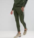 Rose London Skinny Joggers In Khaki With Side Stripes Exclusive To Asos - Green