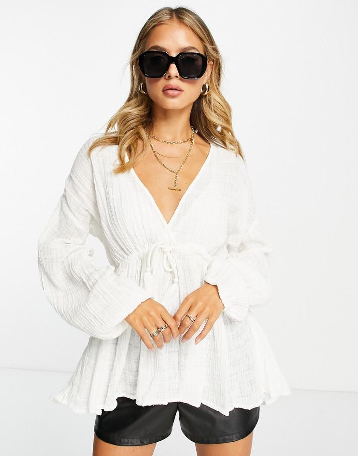 Asos Design Textured Long Sleeve Blouse With Tie Front And Tassle Detail In White