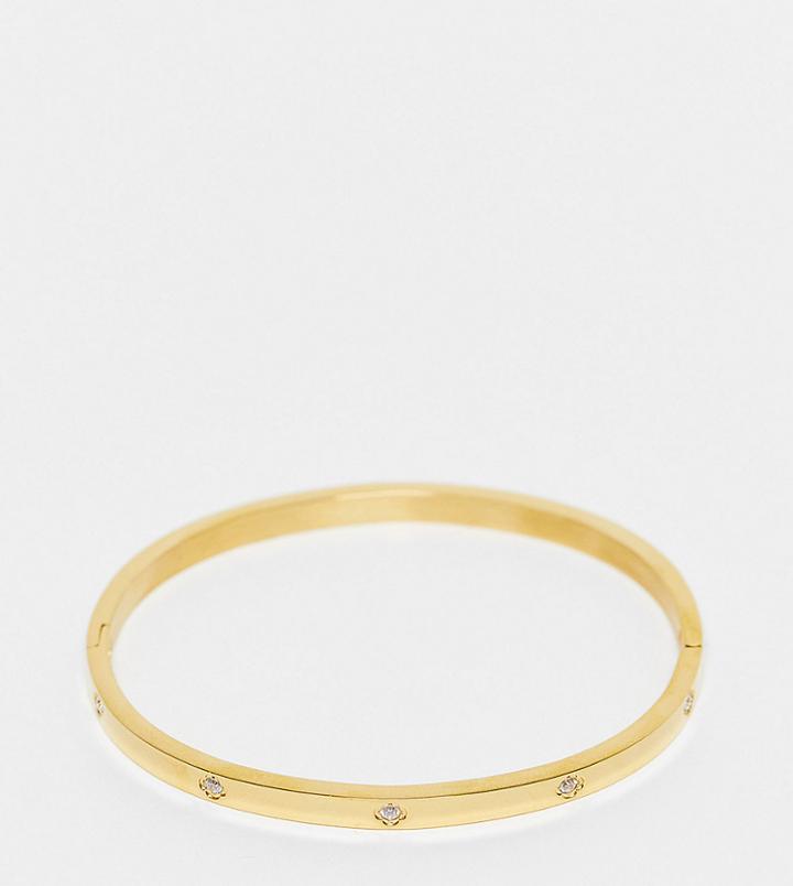 Asos Design Stainless Steel Bangle With Crystal Design In Gold Tone