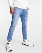 Pull & Bear Slim Fit Jeans With Rips In Mid Blue-blues