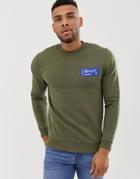 Asos Design Sweatshirt With Chest Print In Khaki-green