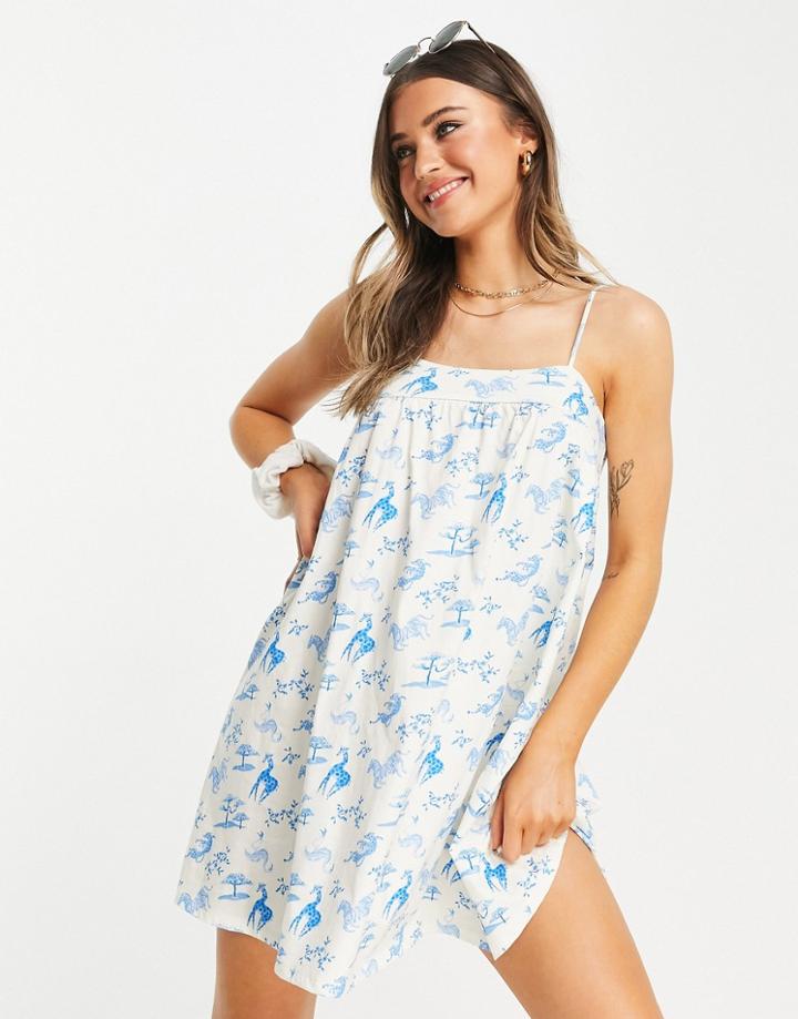 Asos Design Mini Smock Seam Sundress In Cream And Blue Animal Conversational Print-white