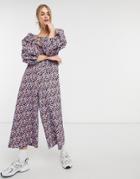 Asos Design Double Puff Sleeve Tie Front Jumpsuit In Purple Floral-multi