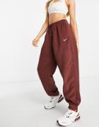 Nike Essentials Plush High-rise Cuffed Fleece Sweatpants In Bronze-brown
