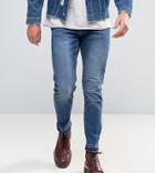 Mennace Slim Muscle Fit Cropped Jeans With Raw Hem In Dark Wash - Blue