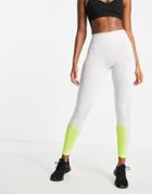 Puma Running Favorite Mid Rise Leggings With Yellow Pop In Gray