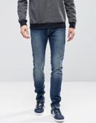 Jack & Jones Intelligence Slim Fit Jeans In Mid Blue Wash With Rip Rep