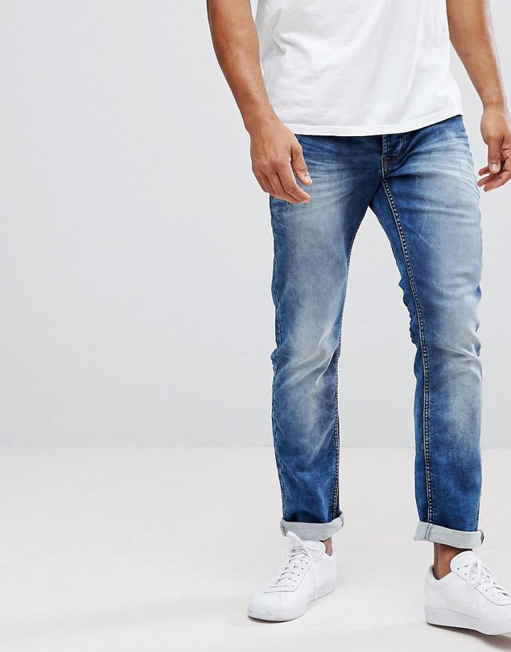 Solid Slim Fit Jeans In Hybrid Denim - Blue