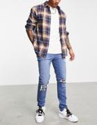 Asos Design Skinny Jeans In Mid Wash Blue With Knee Rips-blues