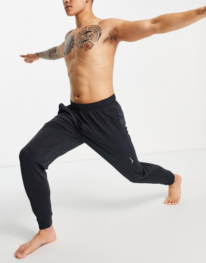 Nike Yoga Dri-fit Sweatpants In Black