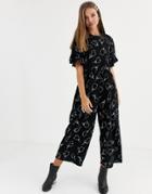 Asos Design Smock Jumpsuit With Frill Sleeve In Abstract Mono Floral Print