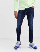 Asos Design Spray On Jeans In Power Stretch In Dark Was With Abrasions-blue