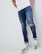 Asos Design Extreme Super Skinny Jeans In Dark Wash Blue With Rips And Embroidery - Blue