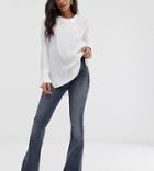 Asos Design Maternity Super Low Rise Flare Jeans In Dark Stone Wash Blue With Over The Bump Waistband - Blue