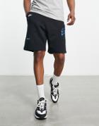 Nike Sport Essentials Multi Futura Logo Fleece Shorts In Black