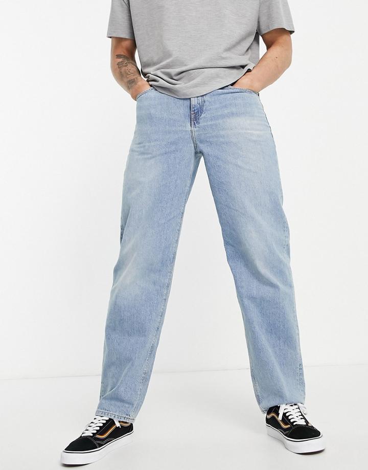 Asos Design Baggy Jeans In Vintage Light Wash-blues