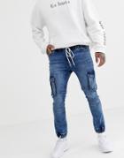 Asos Design Super Skinny Biker Jogger Jeans In Mid Wash Blue